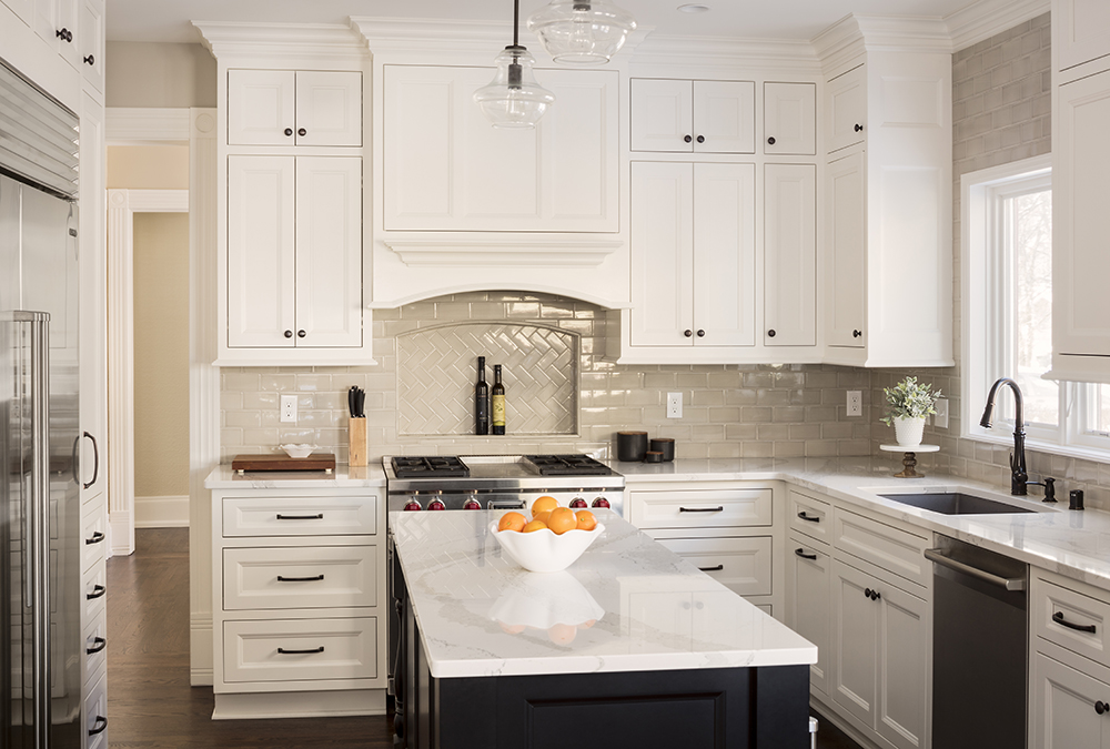 kitchen with white cabinetry and countertops