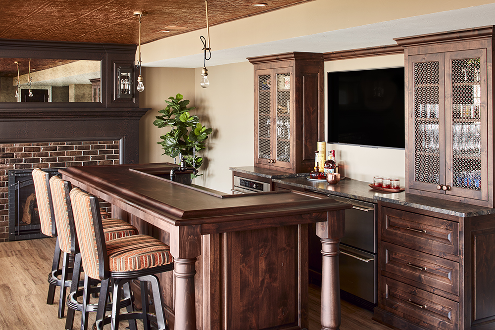 kitchen with wood cabinetry, shelves, flooring, and counter tops